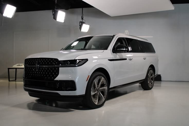White Lincoln Navigator stretch limousine SUV